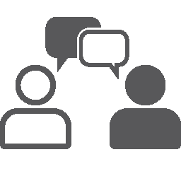 Zwei stilisierte Personen führen ein Gespräch mit Sprechblasen als Symbol für Kommunikation.